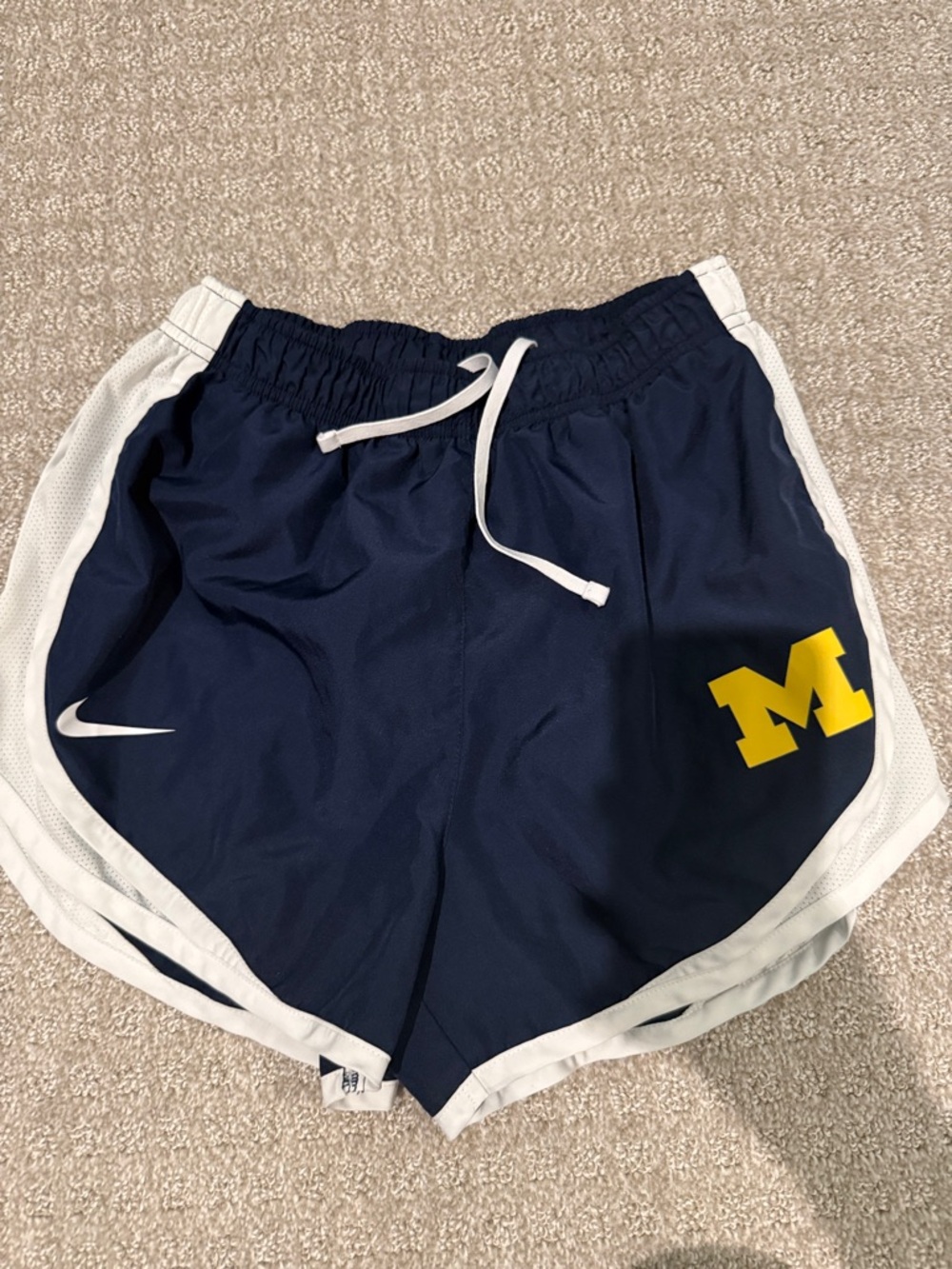 Nike Women's Navy Athletic Shorts with White Trim and Yellow 'M' Logo